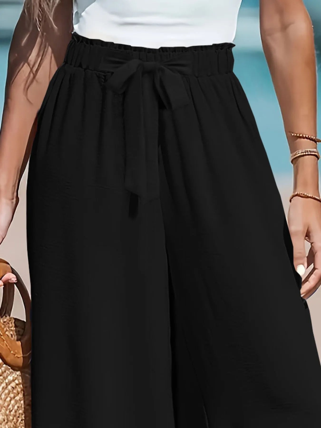 Drawstring waist wide leg pants detail view