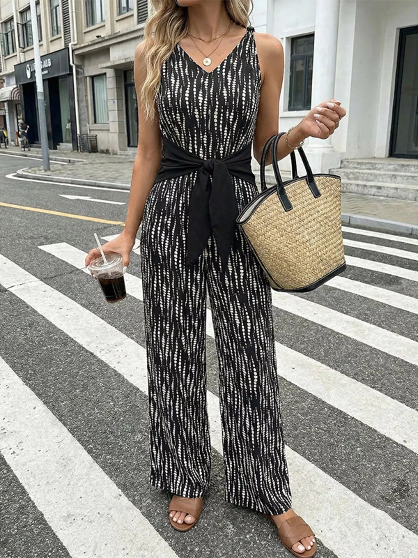 Wide leg jumpsuit in black on model