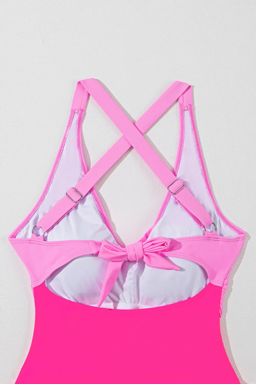 V neck swimsuit crisscross back detail close up