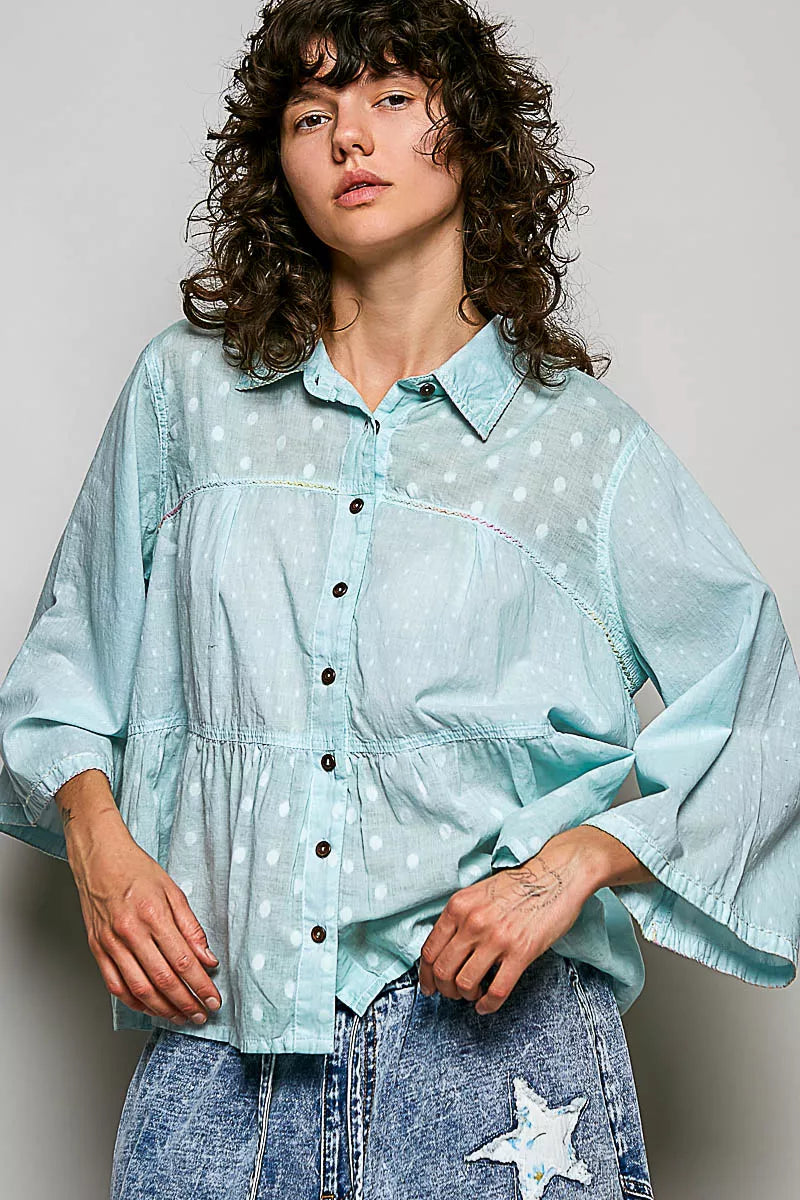 Dot weave button front shirt side view on model