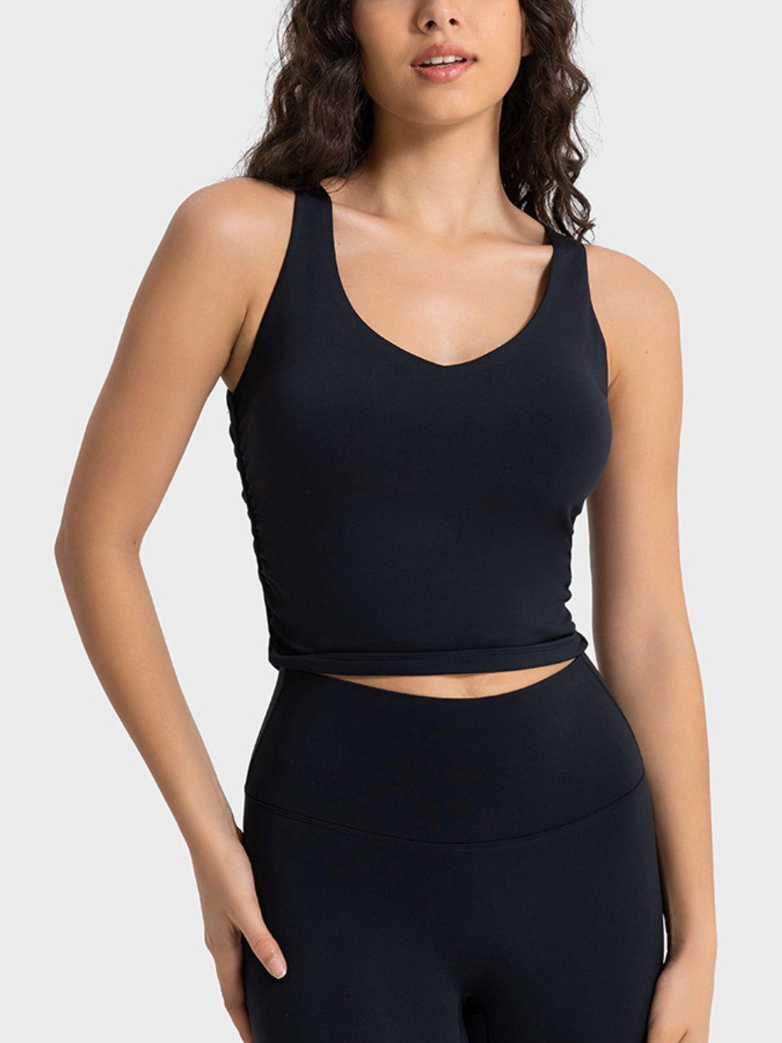 Black cropped tank on model side view