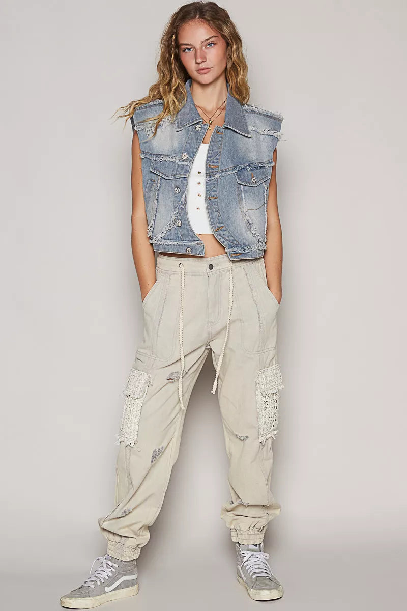 Denim vest raw hem and pocket detail