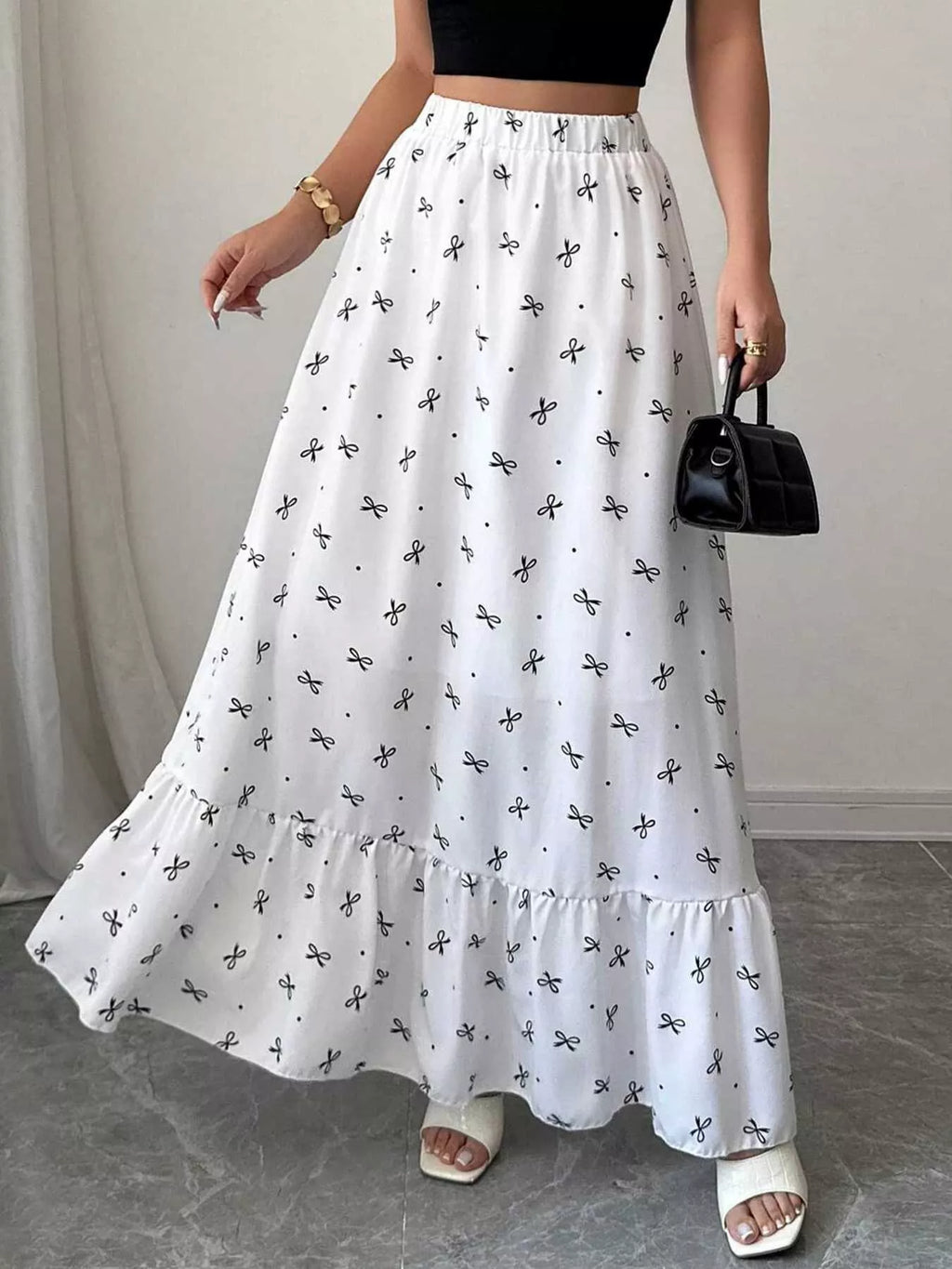 Bowknot print ruffle hem maxi skirt front view in white