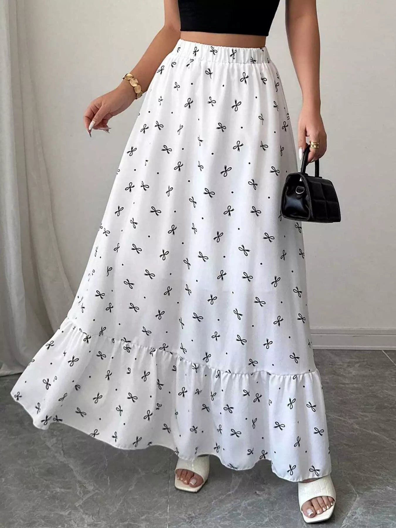 Bowknot print ruffle hem maxi skirt front view in white