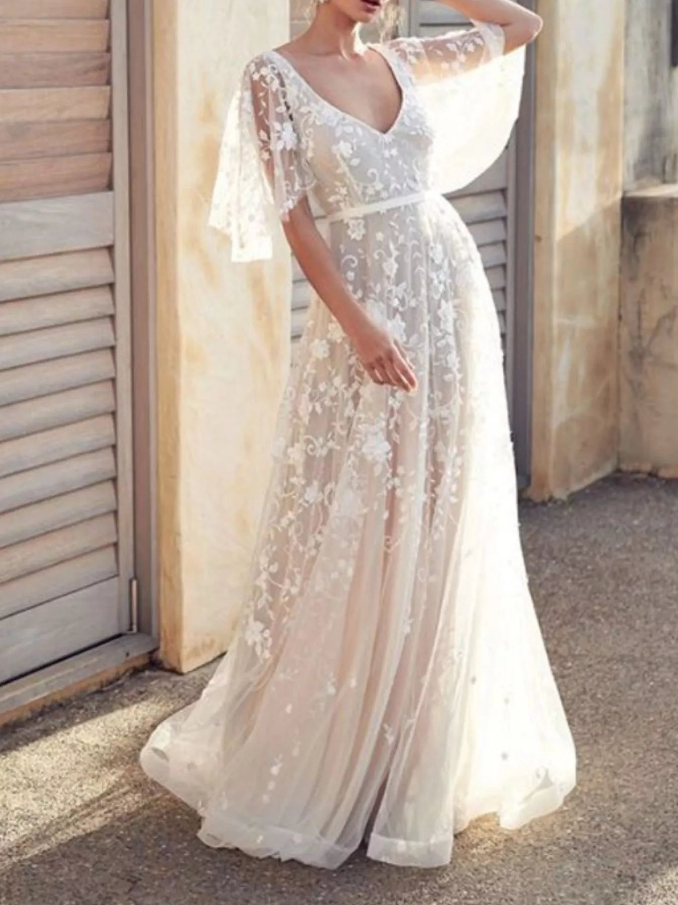 White lace dress back view on model