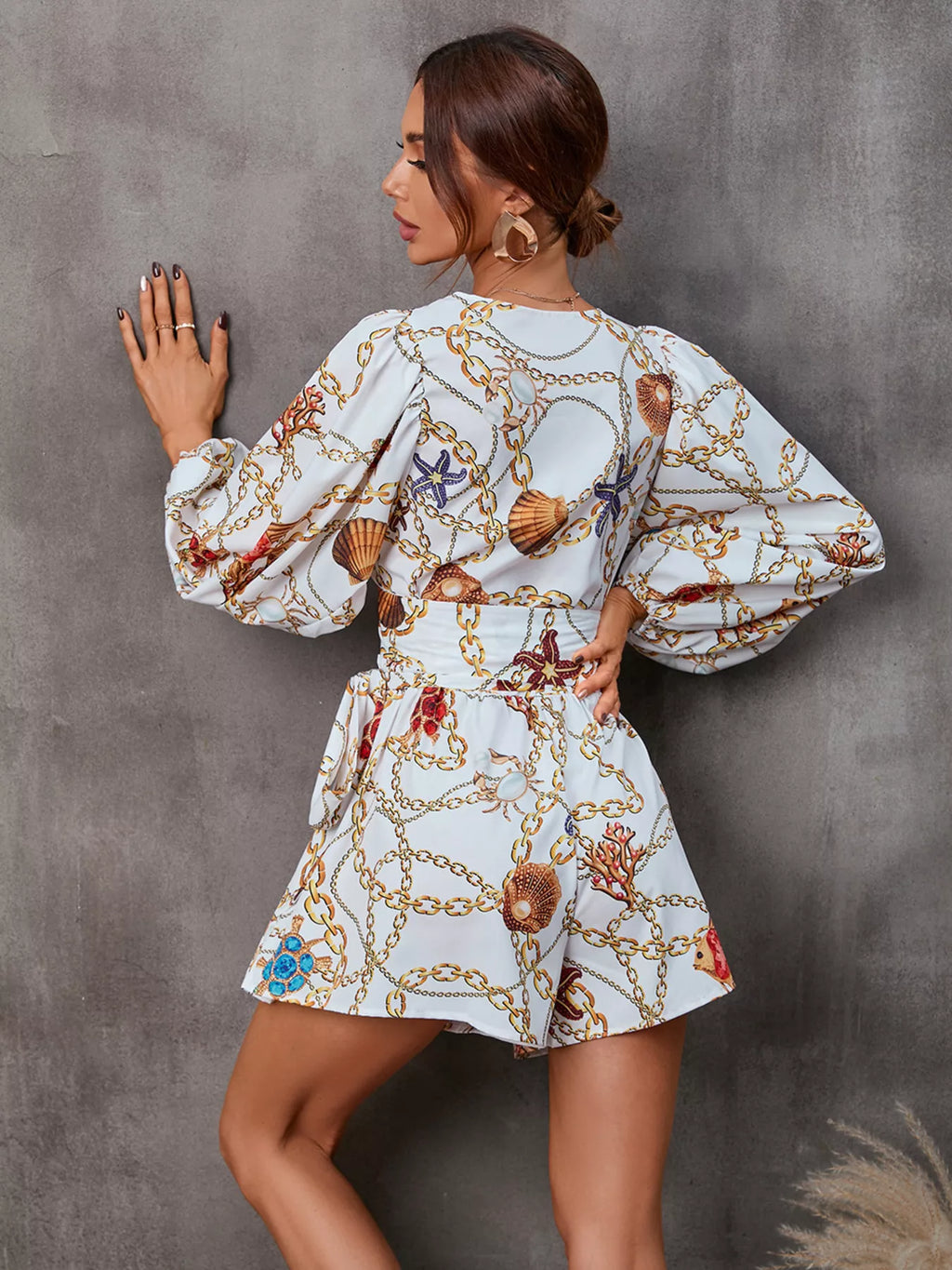Cutout romper back view on model