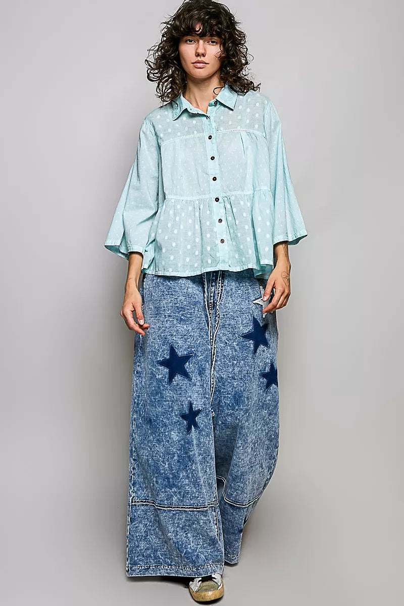 Button front shirt ruffled hem detail
