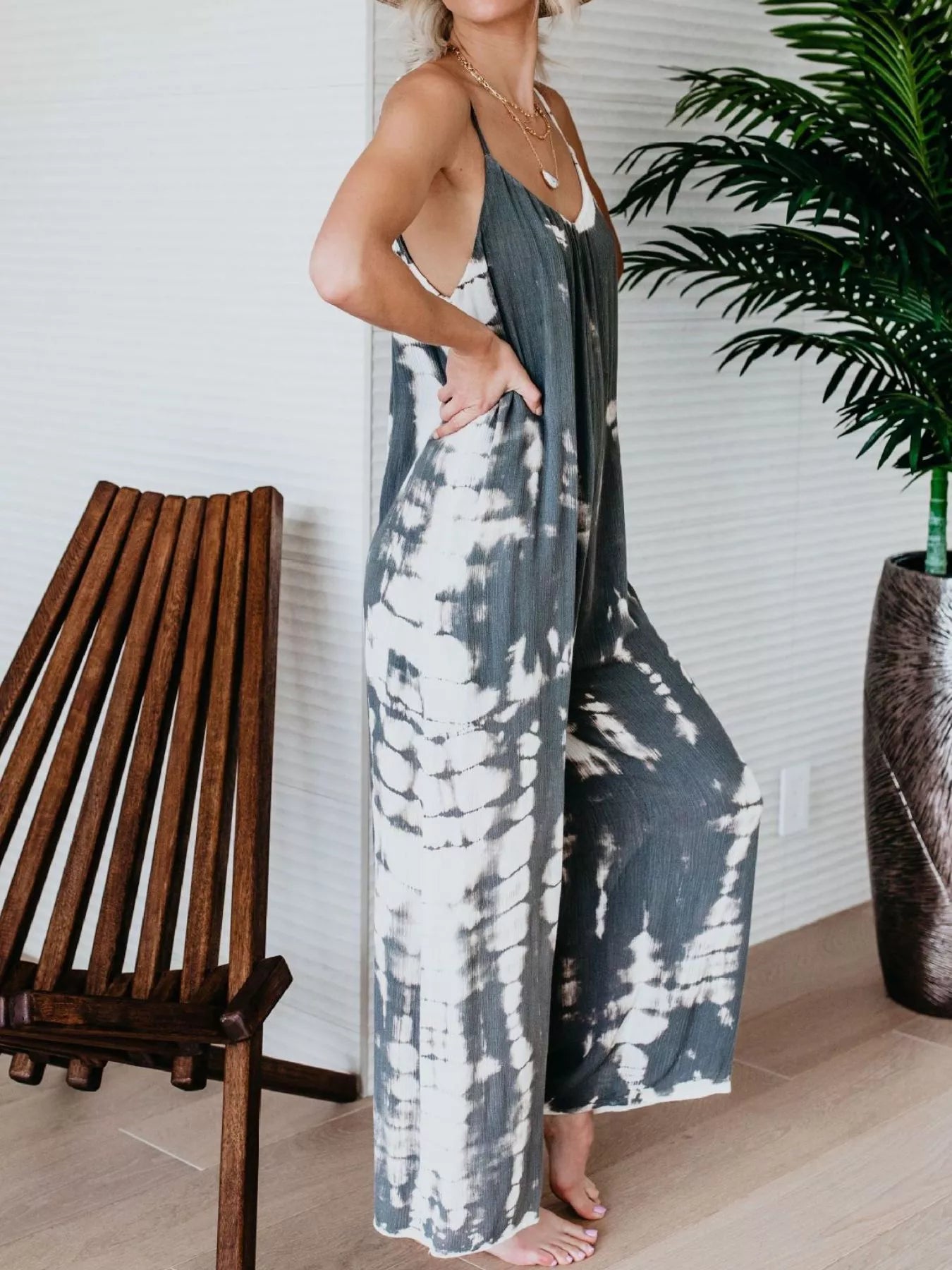 Plus size wide leg jumpsuit side profile view
