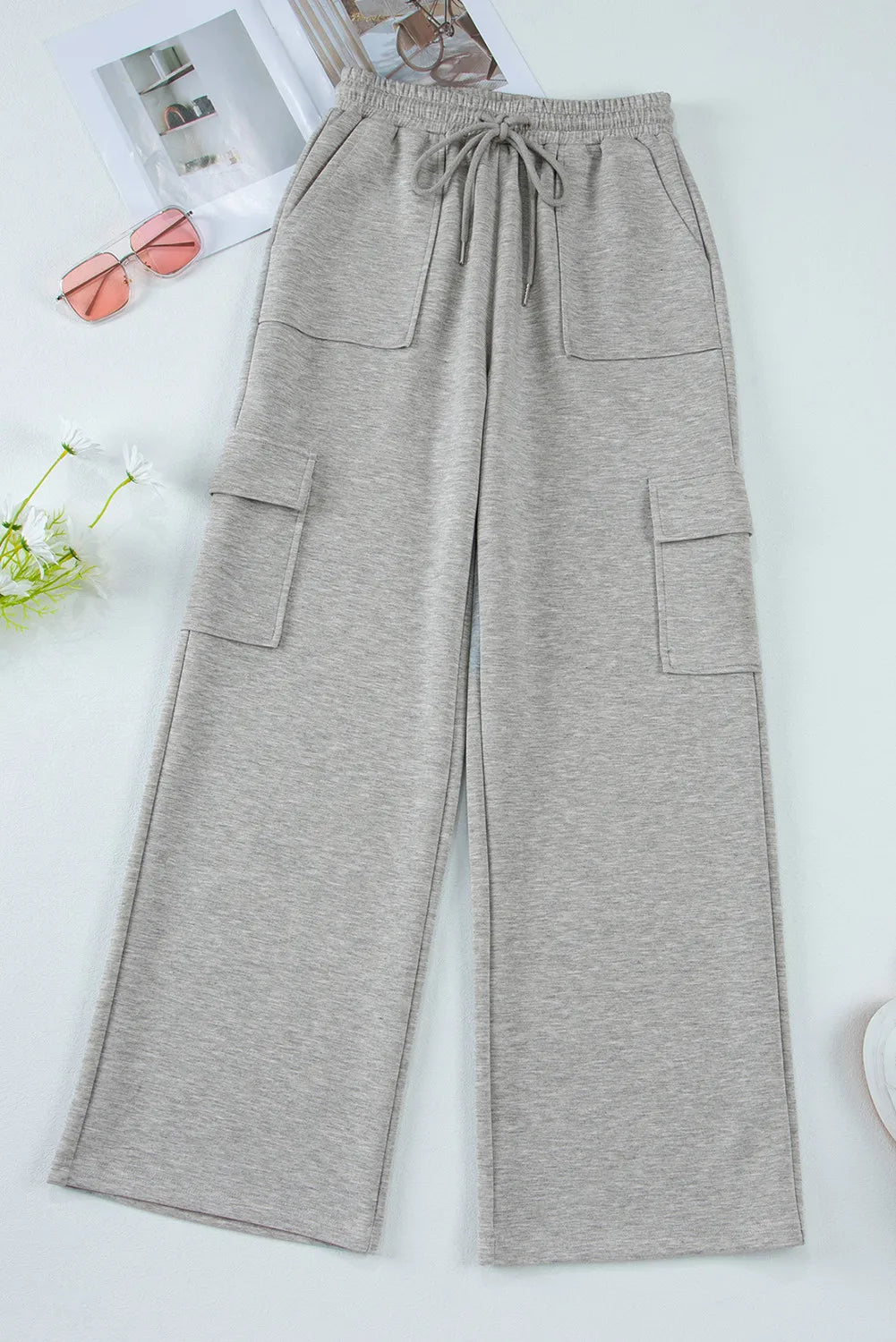 Drawstring active pants side view showing pocket detail