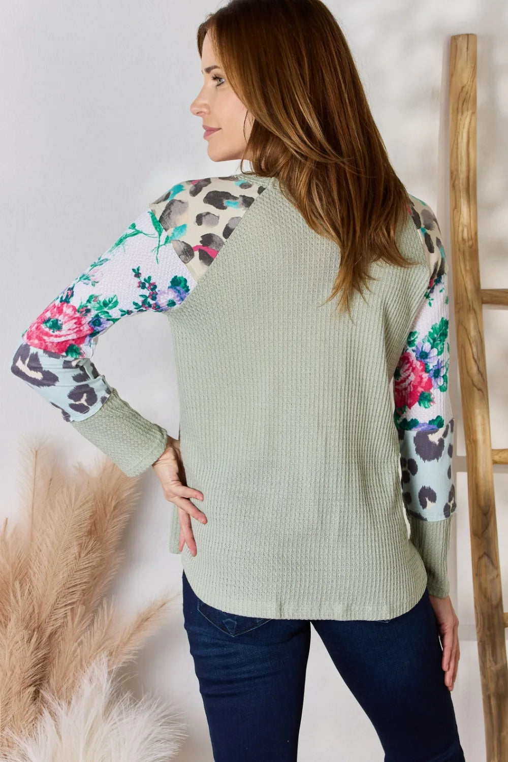 Printed round neck blouse side view showing print
