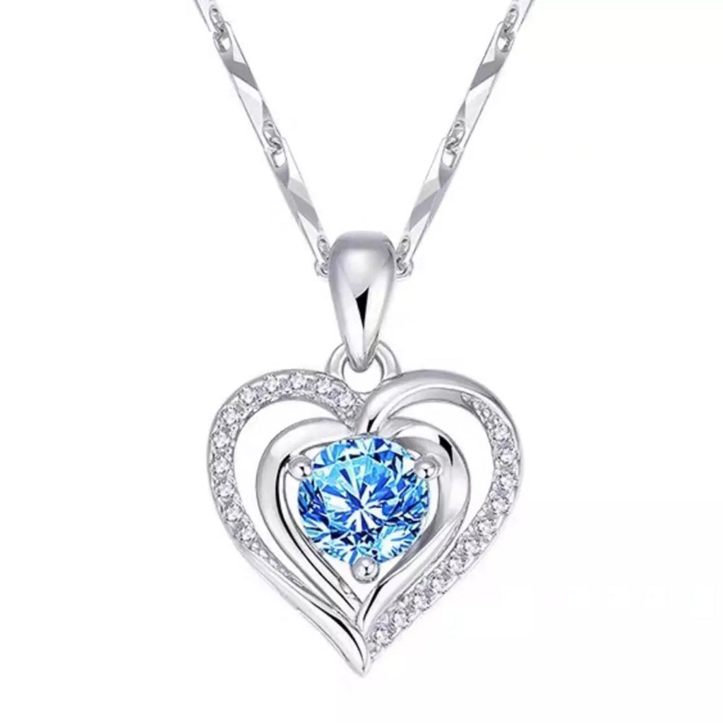 Heart pendant necklace styled on model