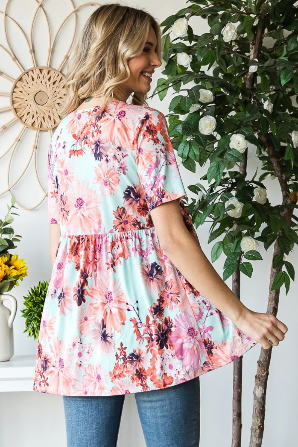 Mint floral babydoll blouse detail of V neckline