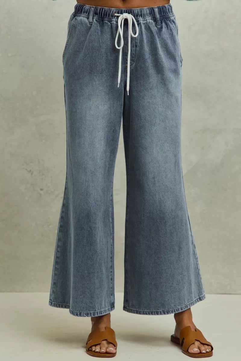 Mid rise elastic waist flare jeans front view