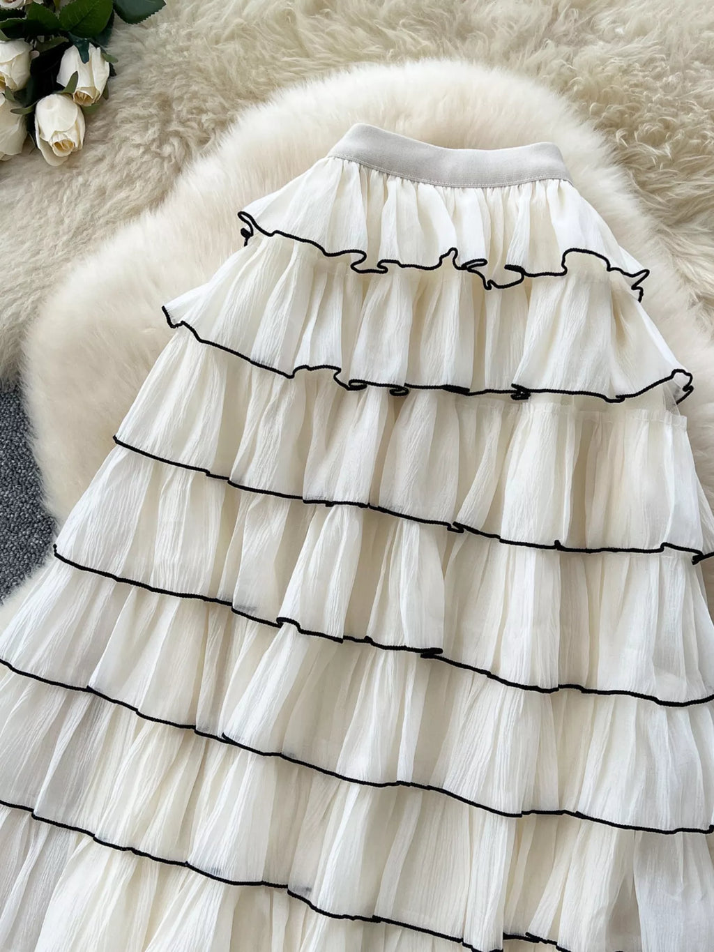 Contrast trim detail on ruffled tiered skirt