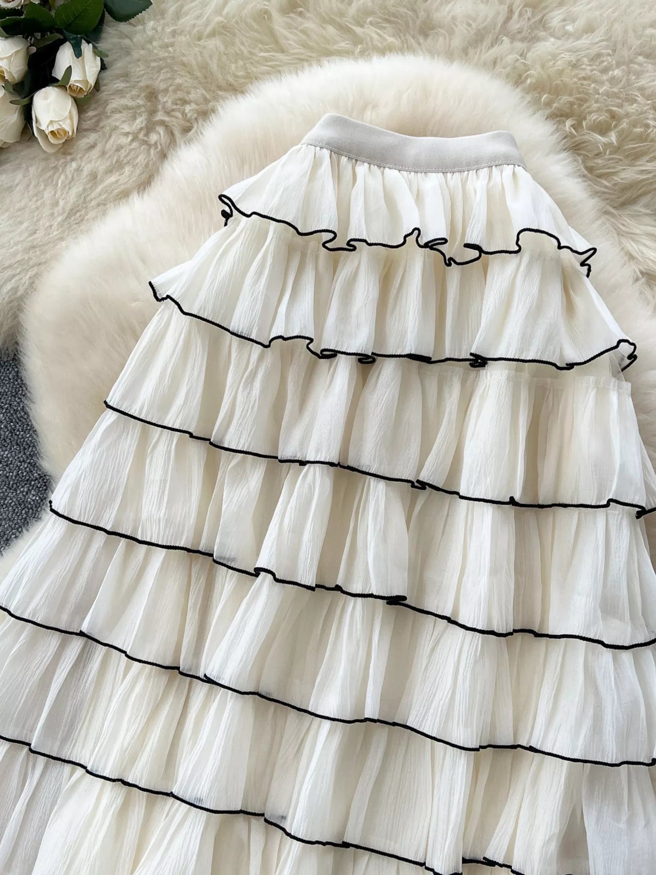 Contrast trim detail on ruffled tiered skirt