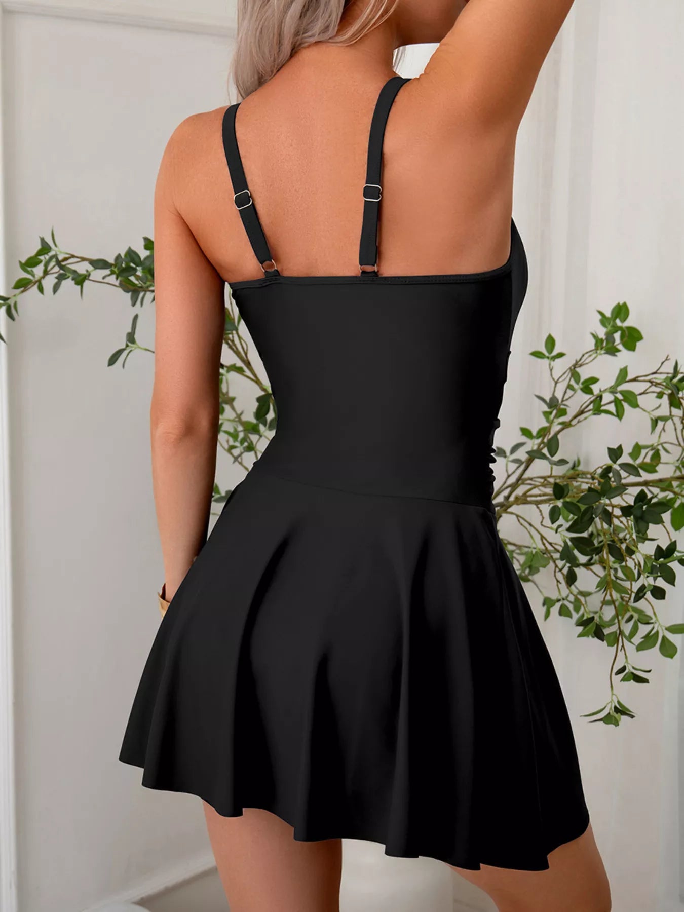 Navy blue one piece swimsuit back view