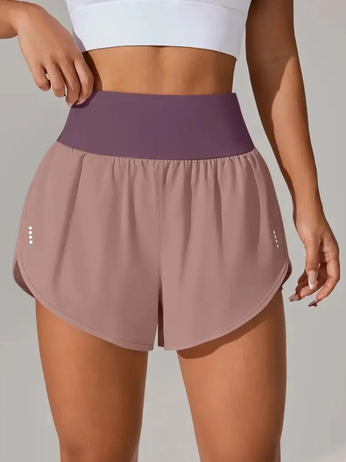 Plum purple active shorts back view showing fit