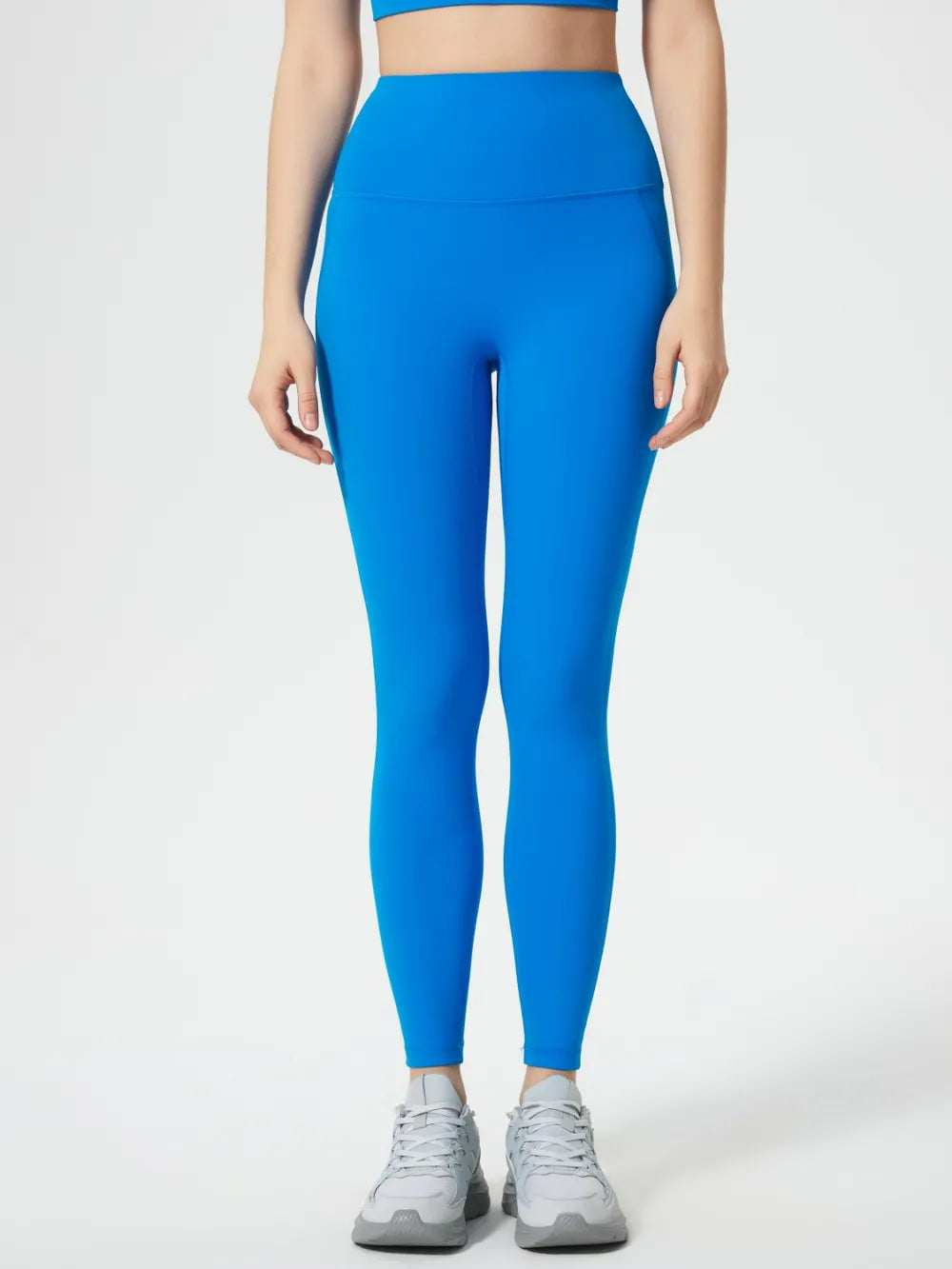 White wide waistband active leggings front view