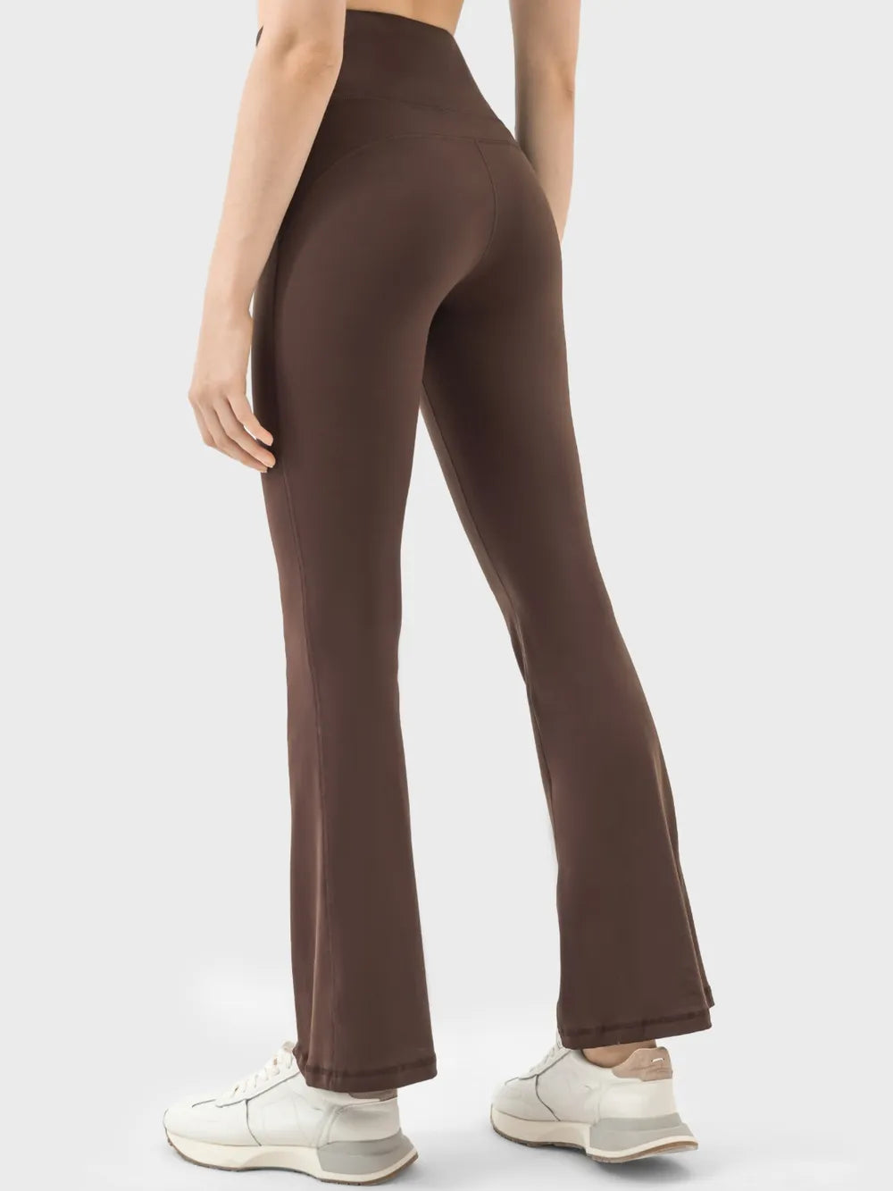 Turquoise active pants side view on model