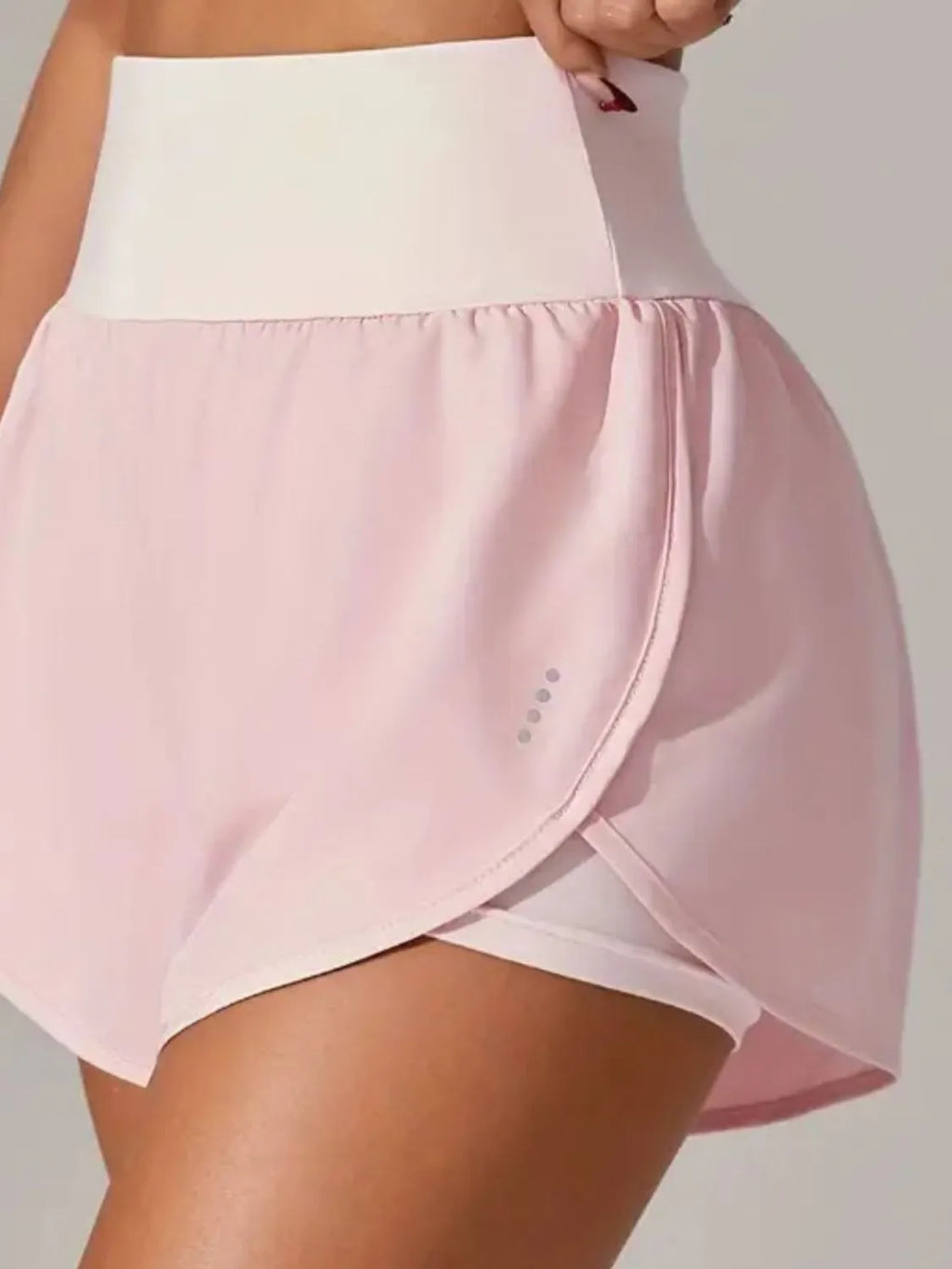High waist active shorts waistband and pocket close up