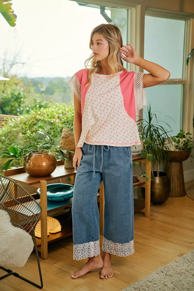 Denim pants with lace trim walking view