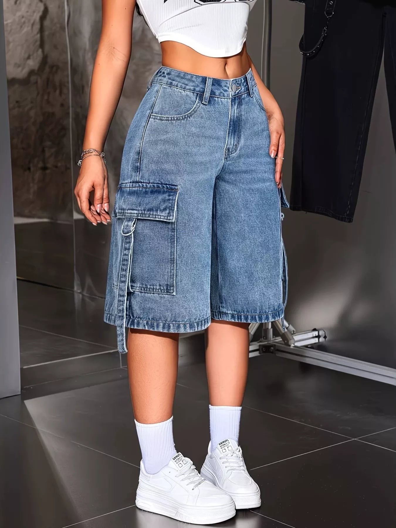 Blue loose fit cargo denim capri jeans front view on model