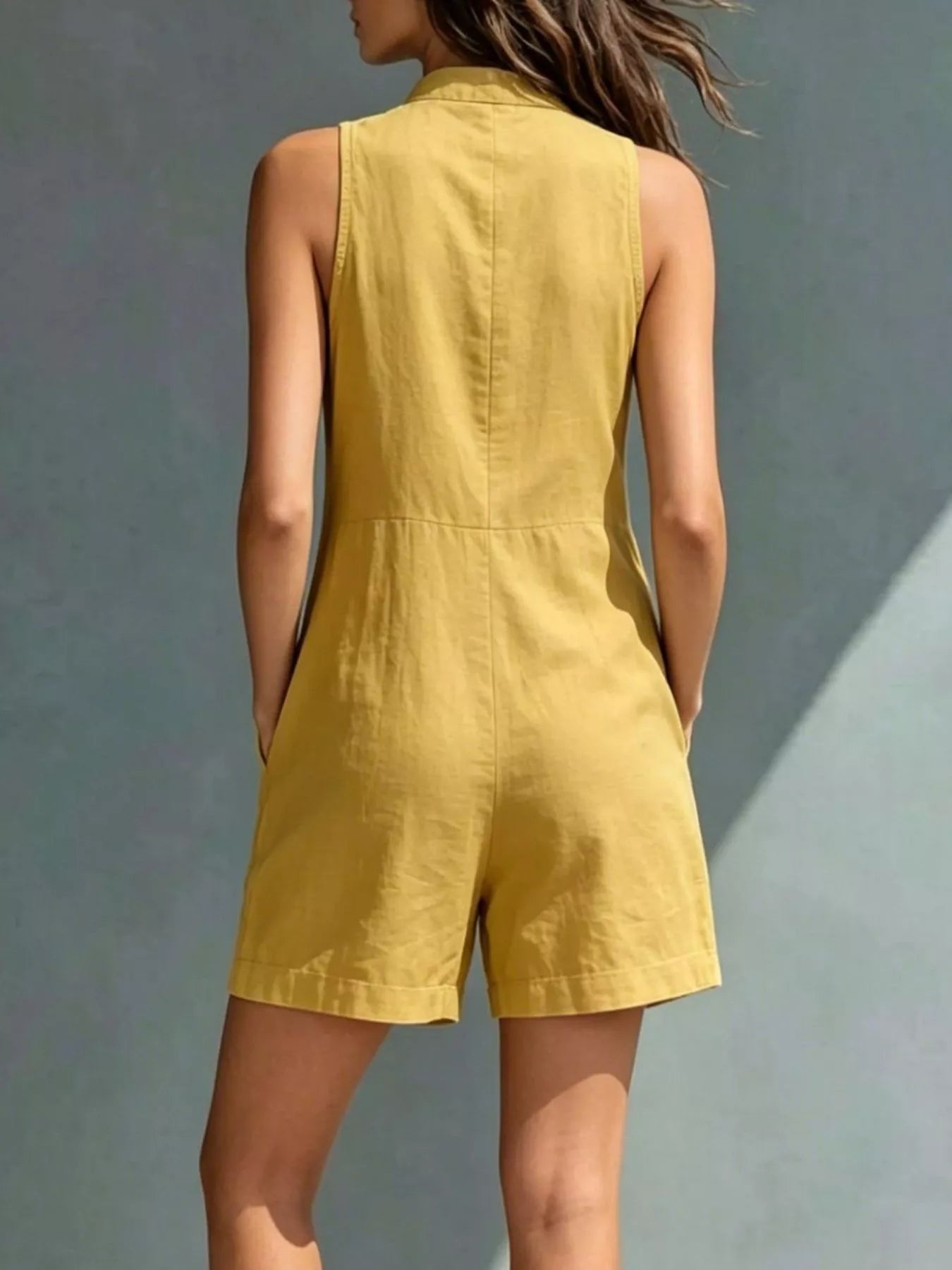 Pocket and button detail on sleeveless romper