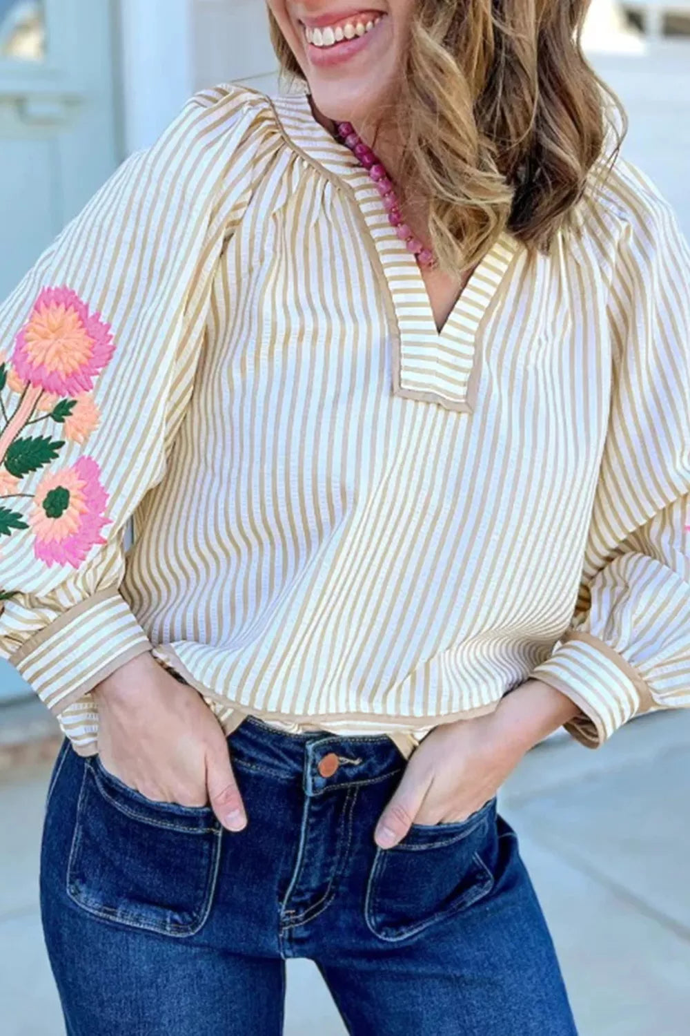 Striped floral embroidered V neck blouse front view