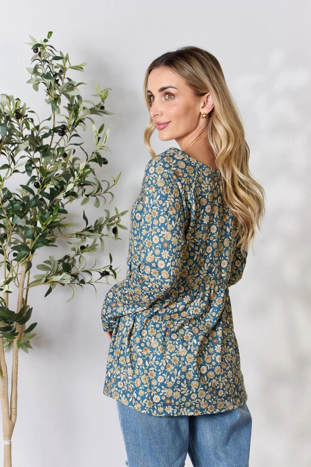 Floral babydoll blouse side view