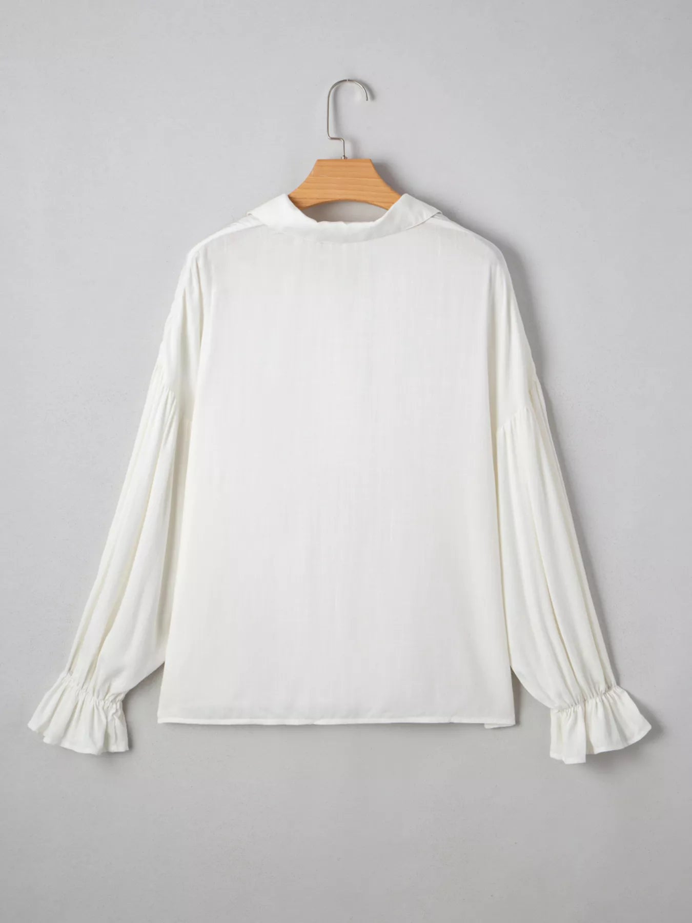 Button front ruffle shirt collar detail