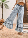 Close up of white denim fabric on flare jeans