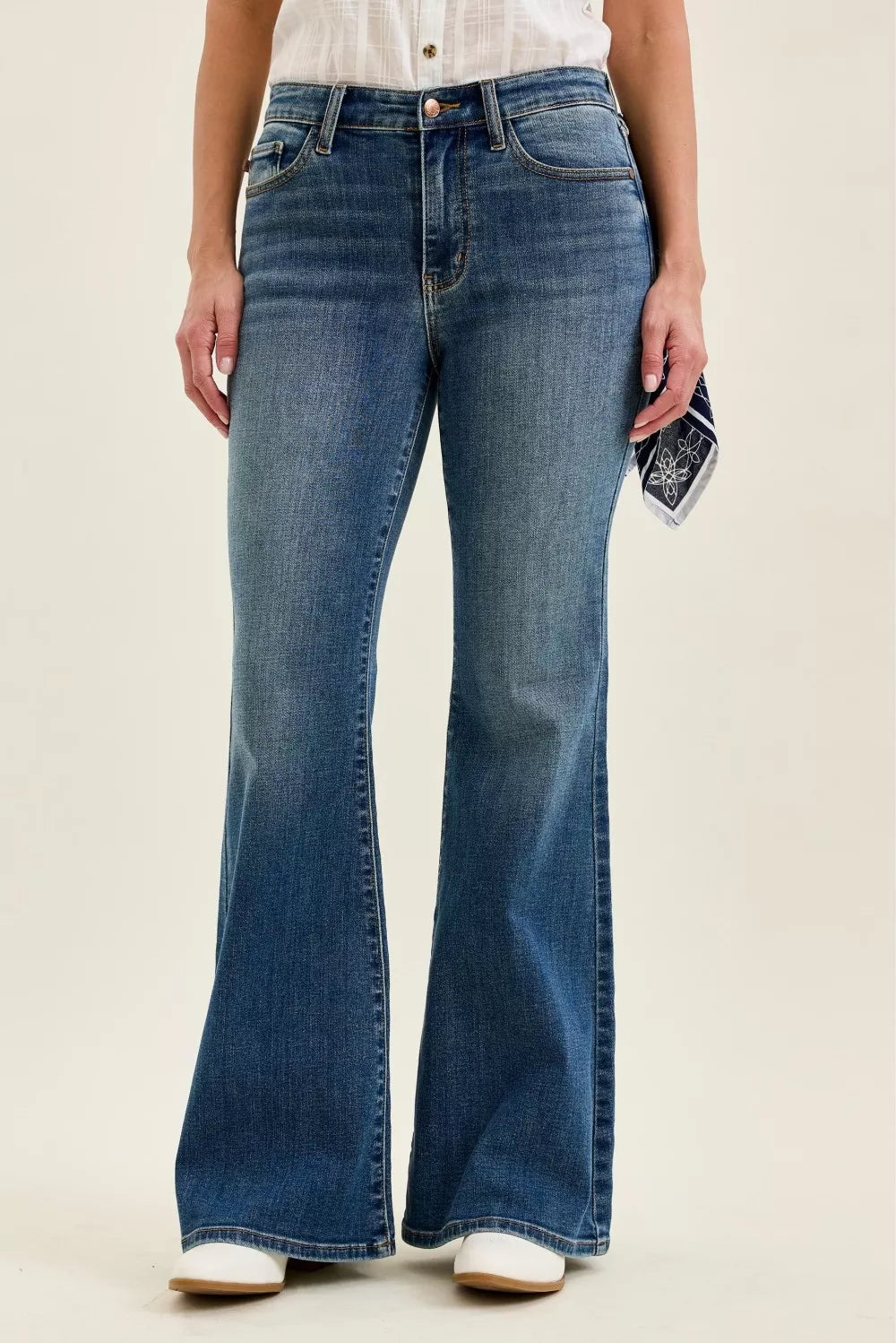 Mid rise flare jeans with triple stitch pockets front view