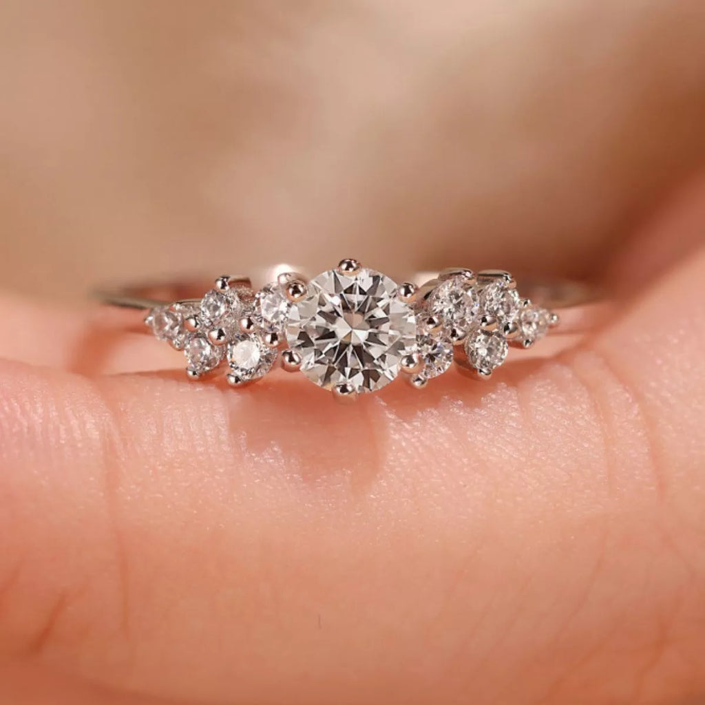 2 carat moissanite ring on hand