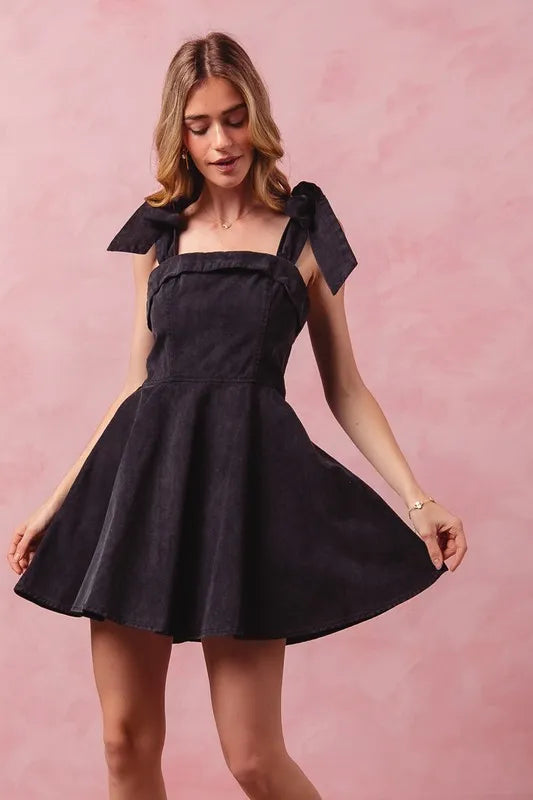 Fit and flare dress back view with bow detail
