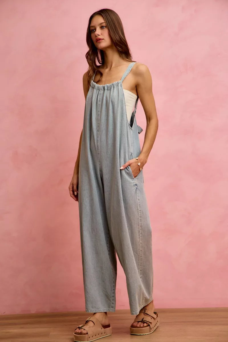 Cotton denim overalls detail of front pocket