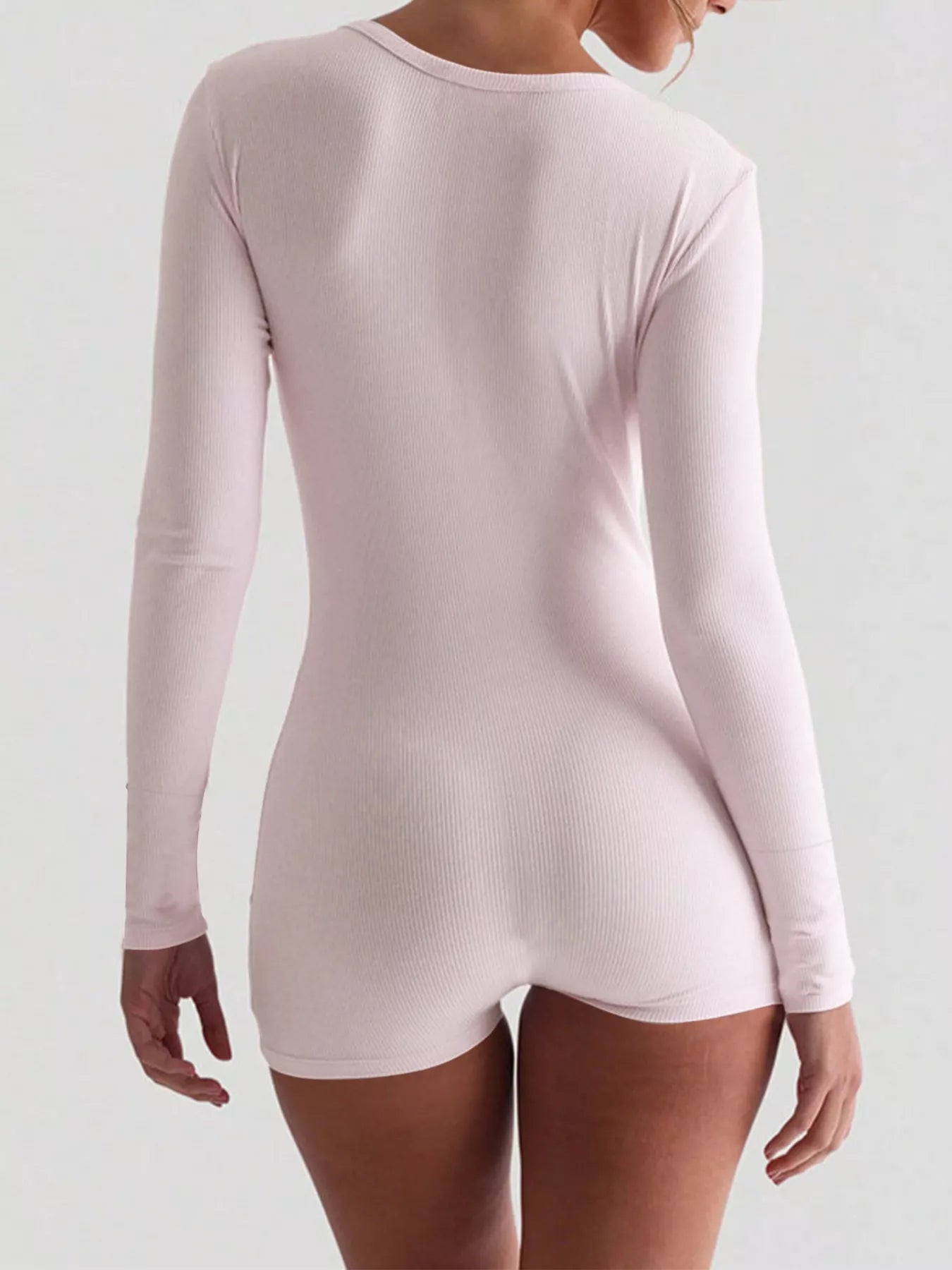 Ribbed knit romper in white styled look