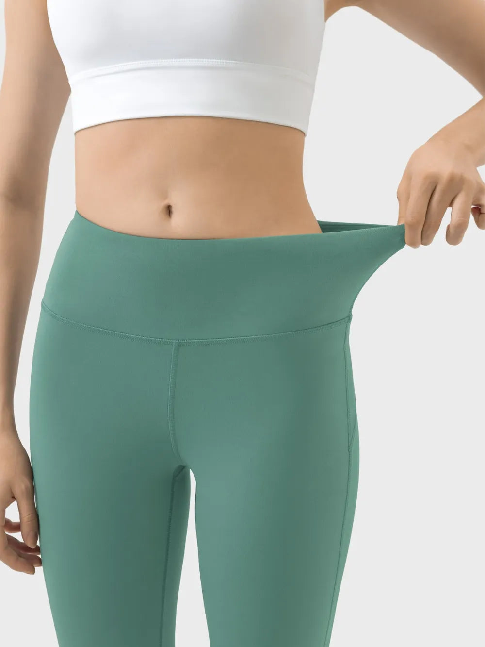 Detail of heliotrope purple active pants waistband