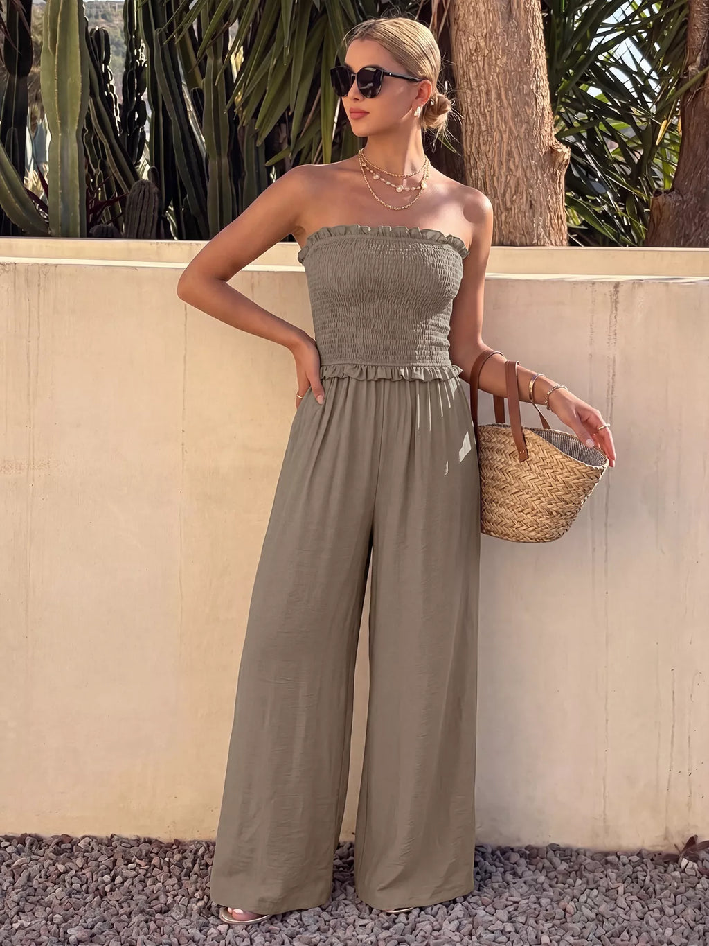 Brown smocked strapless wide leg jumpsuit front view