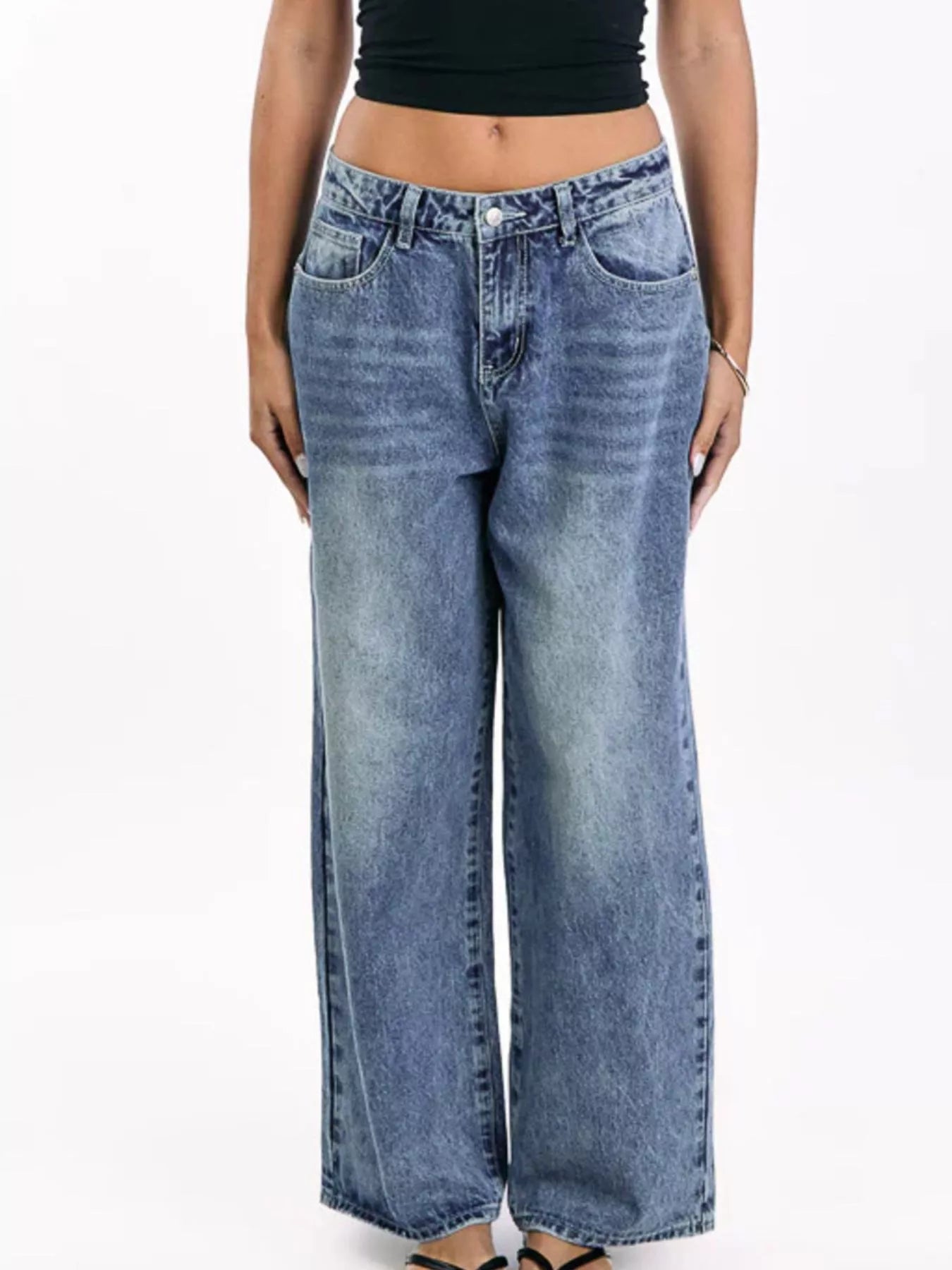 Model wearing pocketed wide leg jeans casual outfit