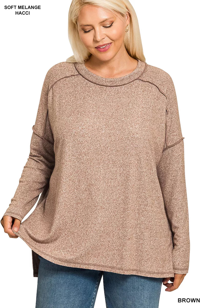 Melange hacci hi low tee detail of exposed seams and knit texture